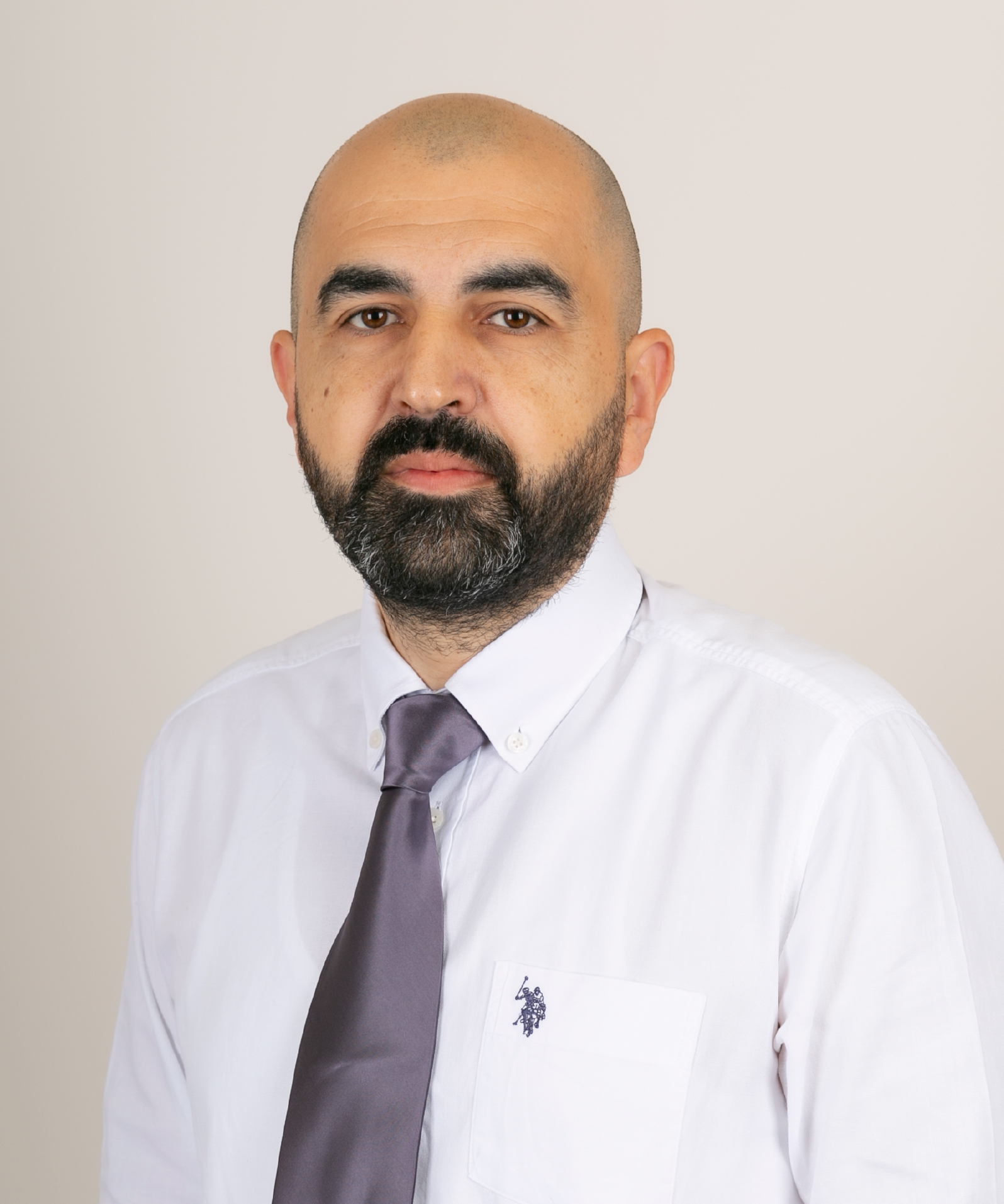 TUĞRUL BAŞARMAK